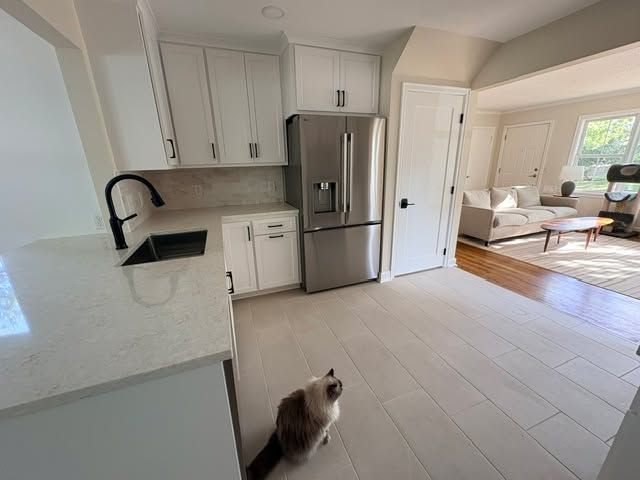 Large-format kitchen floor tile installed in Minneapolis, MN